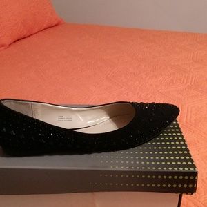 Flat black dress shoes with black gems